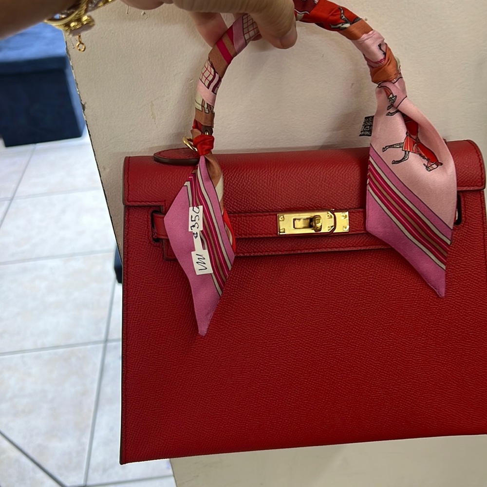 Red leather hand bags